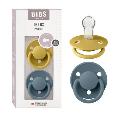 Obrázok produktu pre Bibs De Lux upokojujúci cumlík zo silikónu, 0–36 mesiacov, balenie po 2 ks, farba horčicová/petrolová