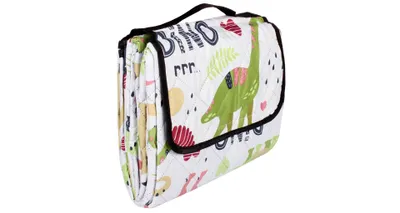 A folded picnic blanket with a dinosaur pattern.