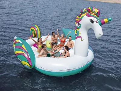 Productafbeelding van Bestway® Opblaasbaar eiland voor in het water, geschikt voor 6 personen, eenhoornmotief, 590 x 404 cm