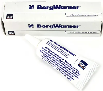 A tube of grease and its packaging are shown against a white background.