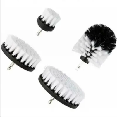 Four drill brush attachments are arranged in a scattered pattern against a white background.