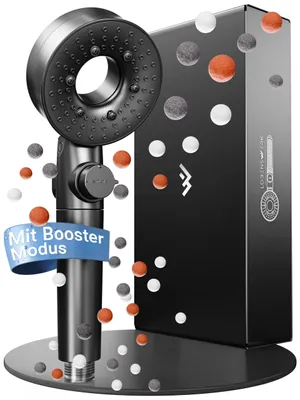 A black shower head and its packaging are displayed on a reflective surface, with small colored beads floating around them.