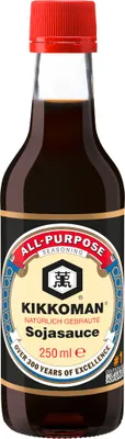 A bottle of Kikkoman soy sauce against a white background.