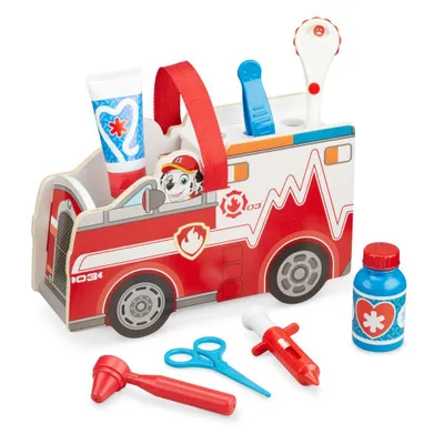 A toy medical kit shaped like a fire truck, with various medical tools and accessories.