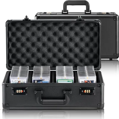A black briefcase with foam interior, holding several stacks of trading cards. Another identical briefcase is visible in the background.
