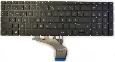 A black laptop keyboard with a ribbon cable attached, isolated on a white background.