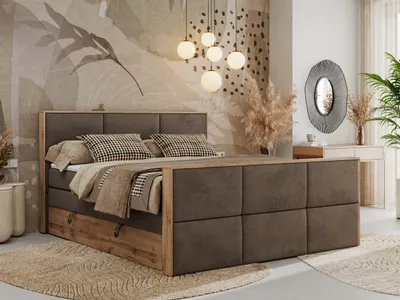 A bedroom scene featuring a bed with bedding, a mirror, and decorative elements.
