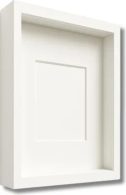 A white shadow box frame with a matted opening.
