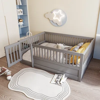 A child's bedroom with a grey wooden bed frame, bedding, and a rug.