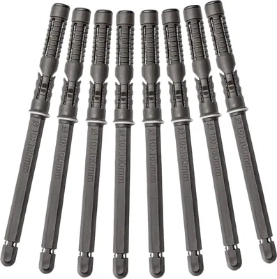 A group of eight identical gray wall plugs arranged diagonally against a white background.