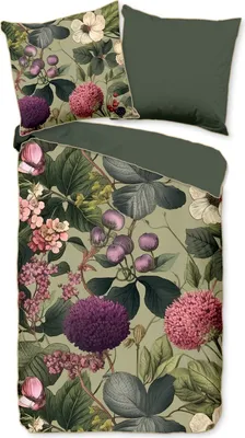 A flat lay of a duvet cover and pillowcase with a floral and leaf pattern, and a plain green pillowcase.