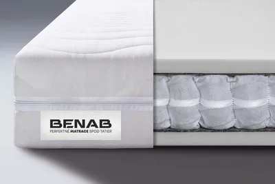 A cutaway view of a mattress showing its internal structure and a label with the brand name.