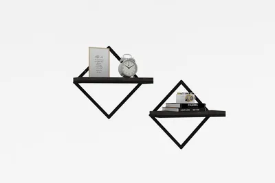 Two diamond-shaped shelves mounted on a white wall, each displaying decorative items.