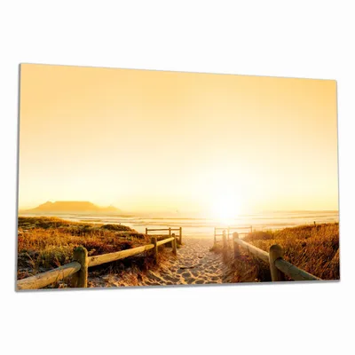 Produktbild von Wallario Herdabdeckplatte aus Glas, Größe 80 x 52 cm 1-teilig, Motiv Strand in Südafrika II - Himmel in orange