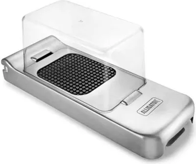 A stainless steel onion and vegetable cutter with a clear plastic lid, shown on a white background.