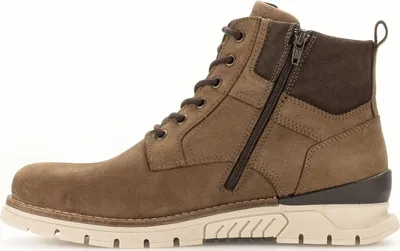 Side view of a brown leather boot.