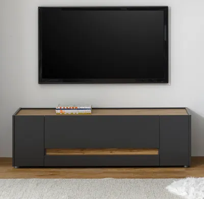 A modern TV stand with a television mounted above it.