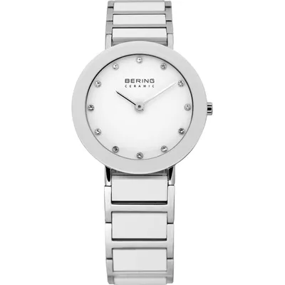 A white Bering ceramic watch with a silver band and diamond accents on the face.
