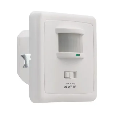 A white motion sensor device mounted on a wall.