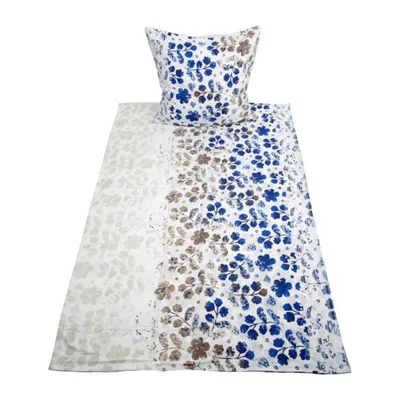 A bedding set including a pillow and a duvet cover with a floral pattern.