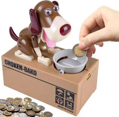A hand is placing a coin into a mechanical dog coin bank.