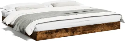 A bed frame with bedding.