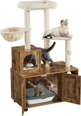 A multi-level cat tree with enclosed spaces and platforms, featuring several cats interacting with it, including one using a litter box housed within the structure.