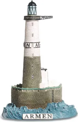 A miniature model of the Ar-Men lighthouse, standing on a base representing waves.