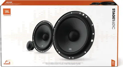 The image shows the packaging of JBL Stage1 601C speakers, with the speakers themselves prominently displayed on the front.