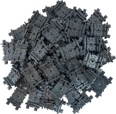 A pile of dark gray LEGO train track pieces.