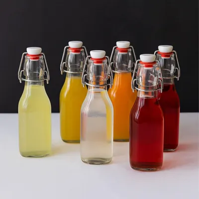 Imagen del producto de Botellas de vidrio con clip, juego de 6 unidades, con etiquetas personalizables