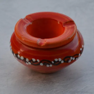 Zdjęcie produktu dla Popielniczka, mała, antynikotynowa, tatuaż pomarańczowy - D 10 cm