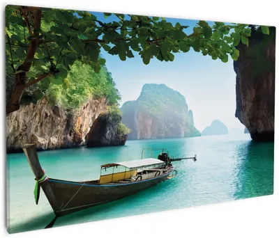Produktbild von Wallario Premium Leinwandbild Fischerboot in Thailand  blaues Meer und Steinfelsen in Größe 60 x 90 cm