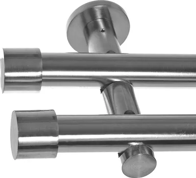 A close-up view of a double curtain rod system made of metal with a brushed stainless steel finish.