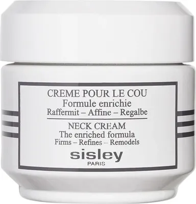 A white jar of Sisley Neck Cream with text on the label.