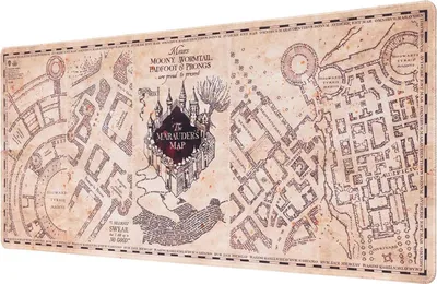 A map of Hogwarts castle, known as the Marauder's Map, is displayed flat.