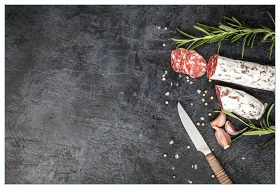 Produktbild von Wallario Küchenrückwand aus Glas, Größe: 90 x 60 cm, Motiv: Salami, Rosmarin und Knoblauch | Spritzschutz | abwischbar | pflegeleicht | in