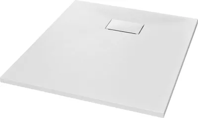 A white shower tray with a drain in the center, shown from a diagonal angle.
