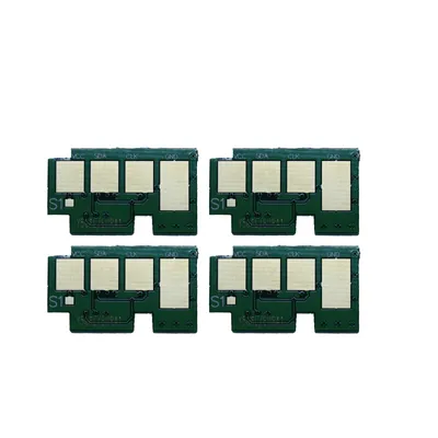Four electronic chips arranged in a grid on a white background.