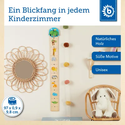 A product display with a wooden height chart decorated with animal figures, a mirror, and a stuffed elephant in a chair.
