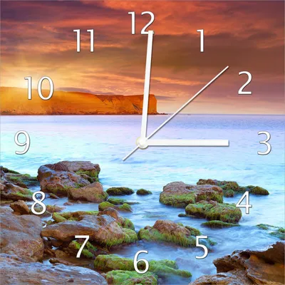 Produktbild von Wallario Design Wanduhr Sonnenaufgang am Meer mit Landzunge und Felsen im Wasser aus Echtglas, Größe 30 x 30 cm