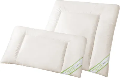 Two white pillows are arranged diagonally on a white background.