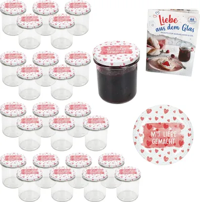 A set of small glass jars with decorative lids, a jar filled with jam, and a recipe booklet.
