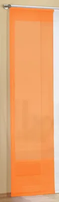 An orange sheer curtain panel hanging from a curtain rod against a wall.