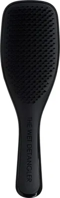 A black hairbrush is shown against a white background.