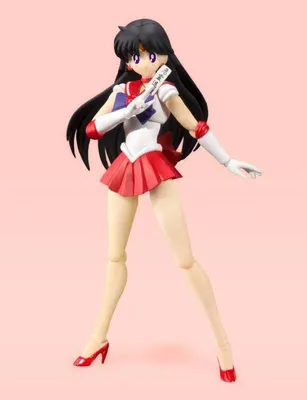 A full-body shot of a Sailor Mars action figure against a plain pink background.