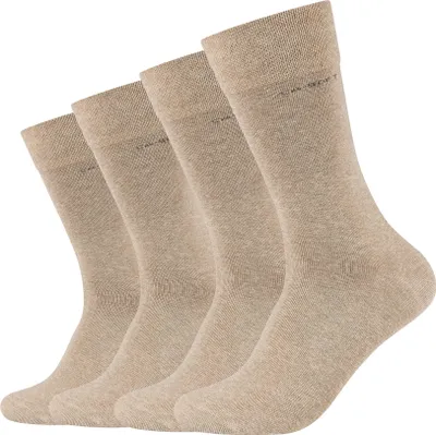 Four beige socks are arranged diagonally on a white background.