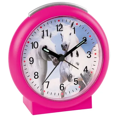A pink alarm clock with a picture of two white horses on the face.