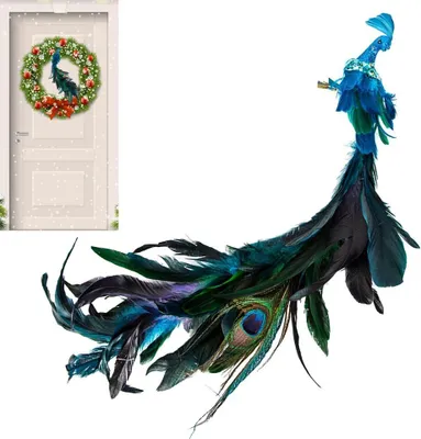 A decorative peacock ornament and a Christmas wreath on a door.