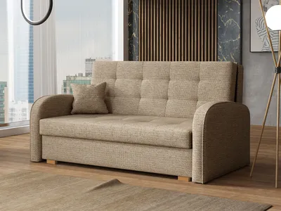 A beige sofa with a small pillow is shown in a modern living room setting with a large window and city view in the background.